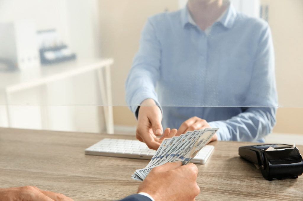 What should you do if you encounter a problem at the teller window?
